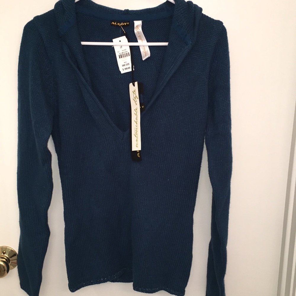 Never been worn Alcott sweater. Tags still on.